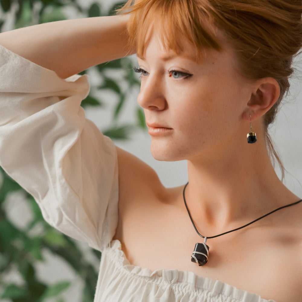 Ayana Wellness energy protection scene showing shield against negativity.