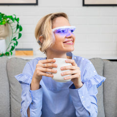 AYO blue light glasses in an office setting for improved focus and mood.