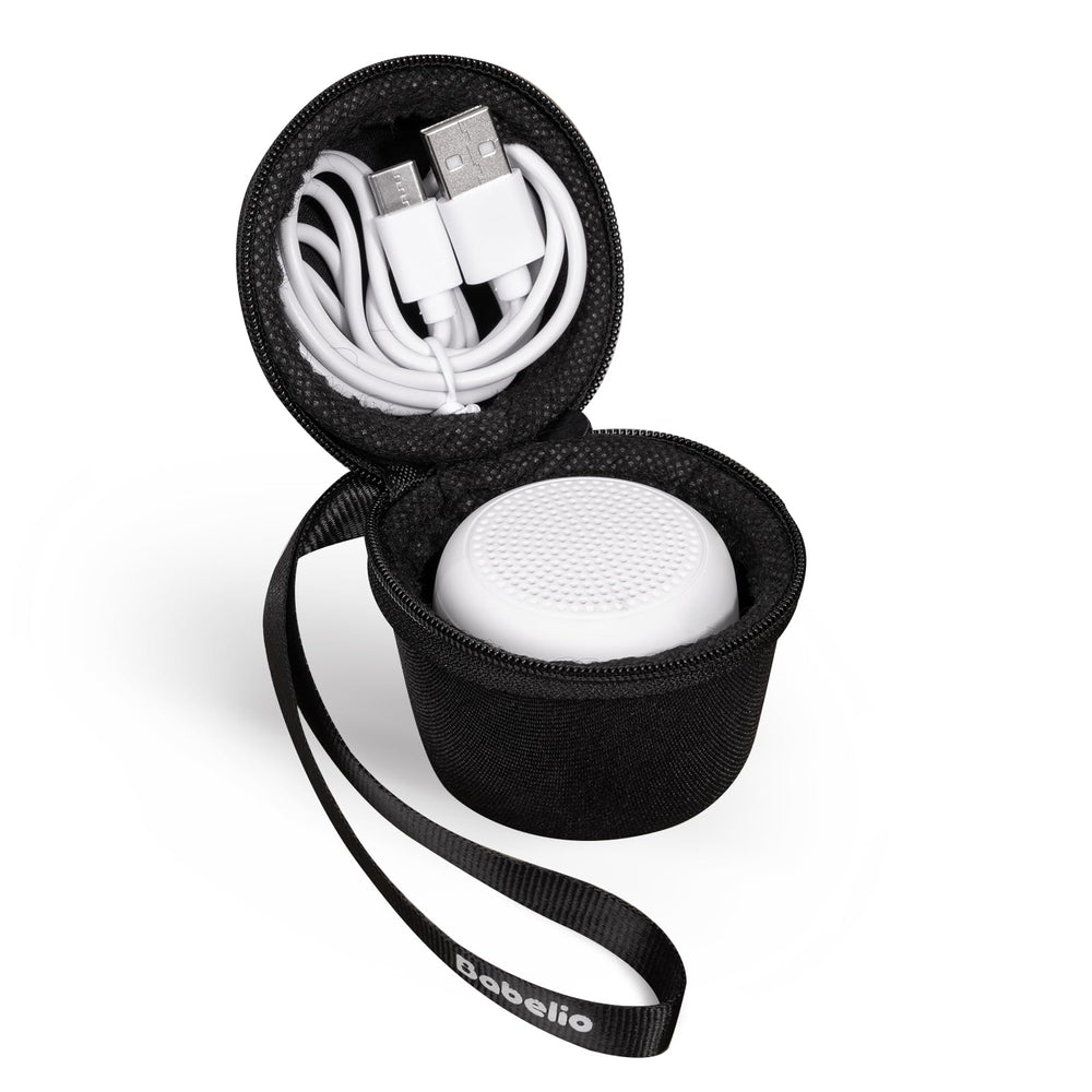 Babelio black textile case protects mini white noise machine and charger.