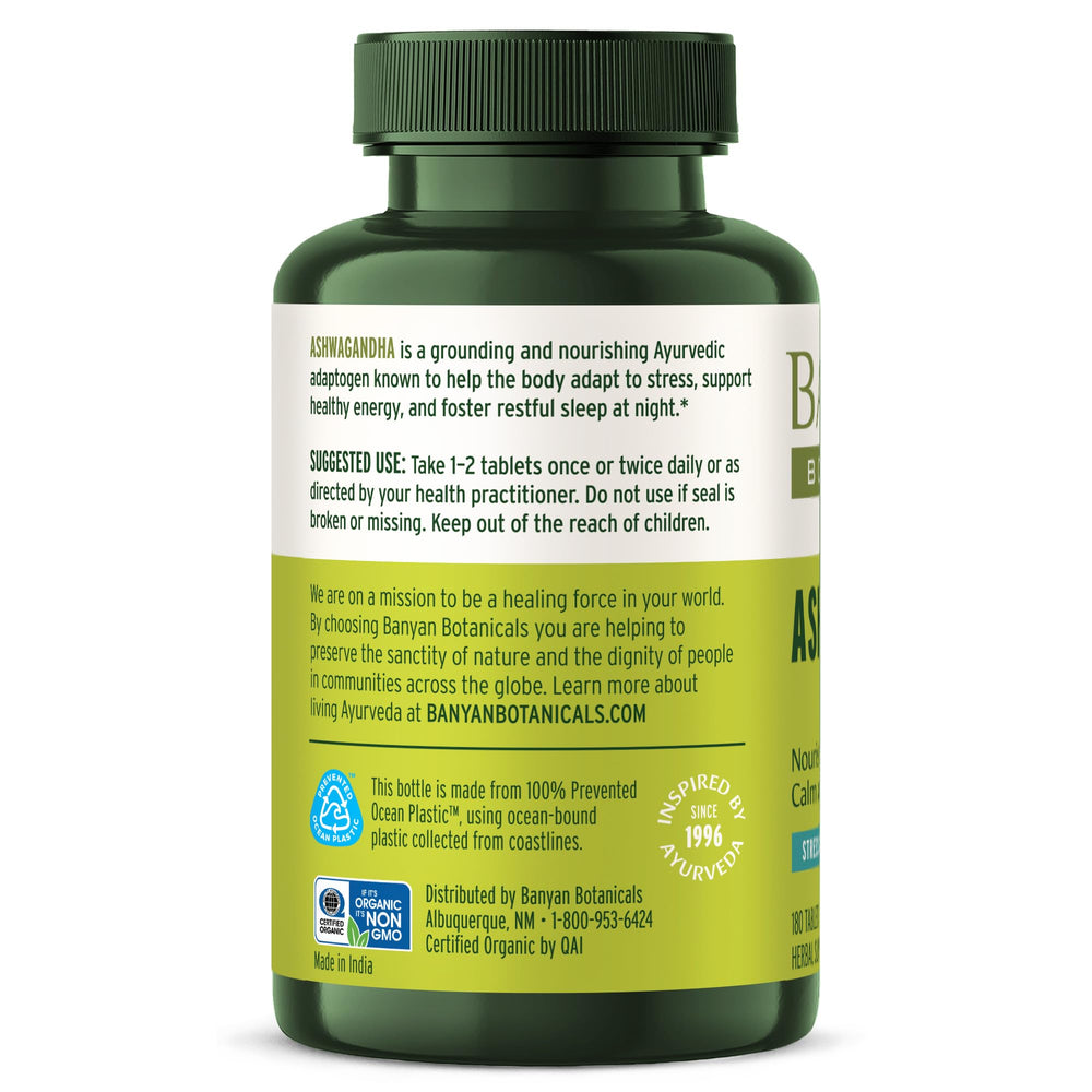Lifestyle image of someone taking Banyan Botanicals Ashwagandha tablet in morning