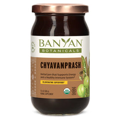 Banyan Botanicals Chyawanprash jar with spoon showing a nourishing herbal paste for daily vitality.