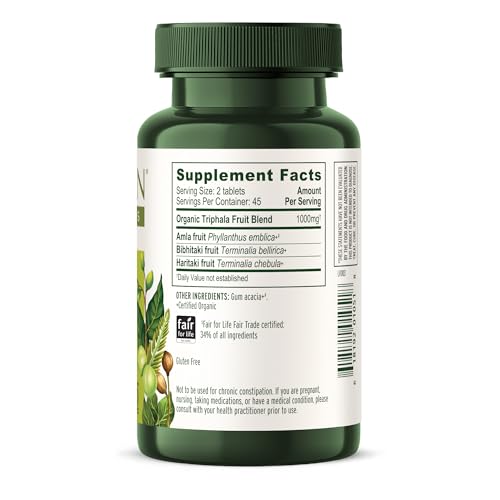 Banyan Botanicals Triphala bottle in kitchen setting—easy daily routine for digestive wellness.