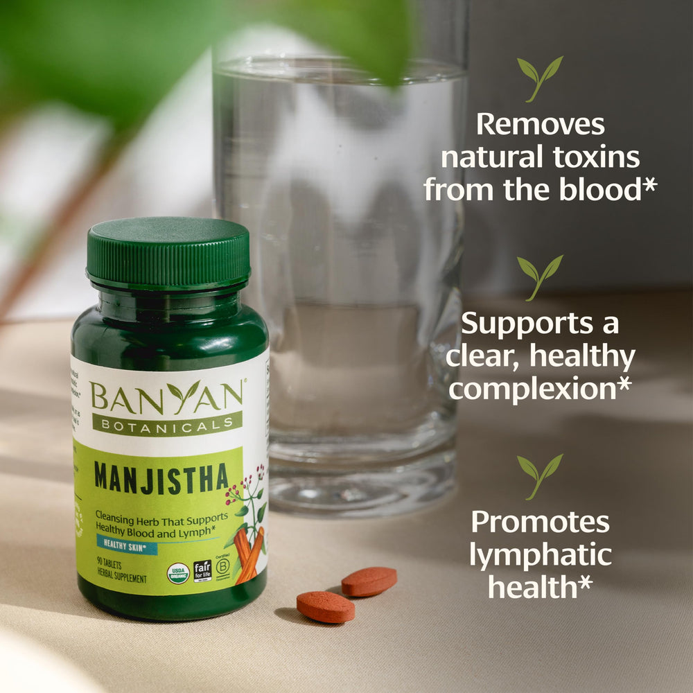Banyan Botanicals Manjistha tablets tablet close-up showing smooth texture and quality.