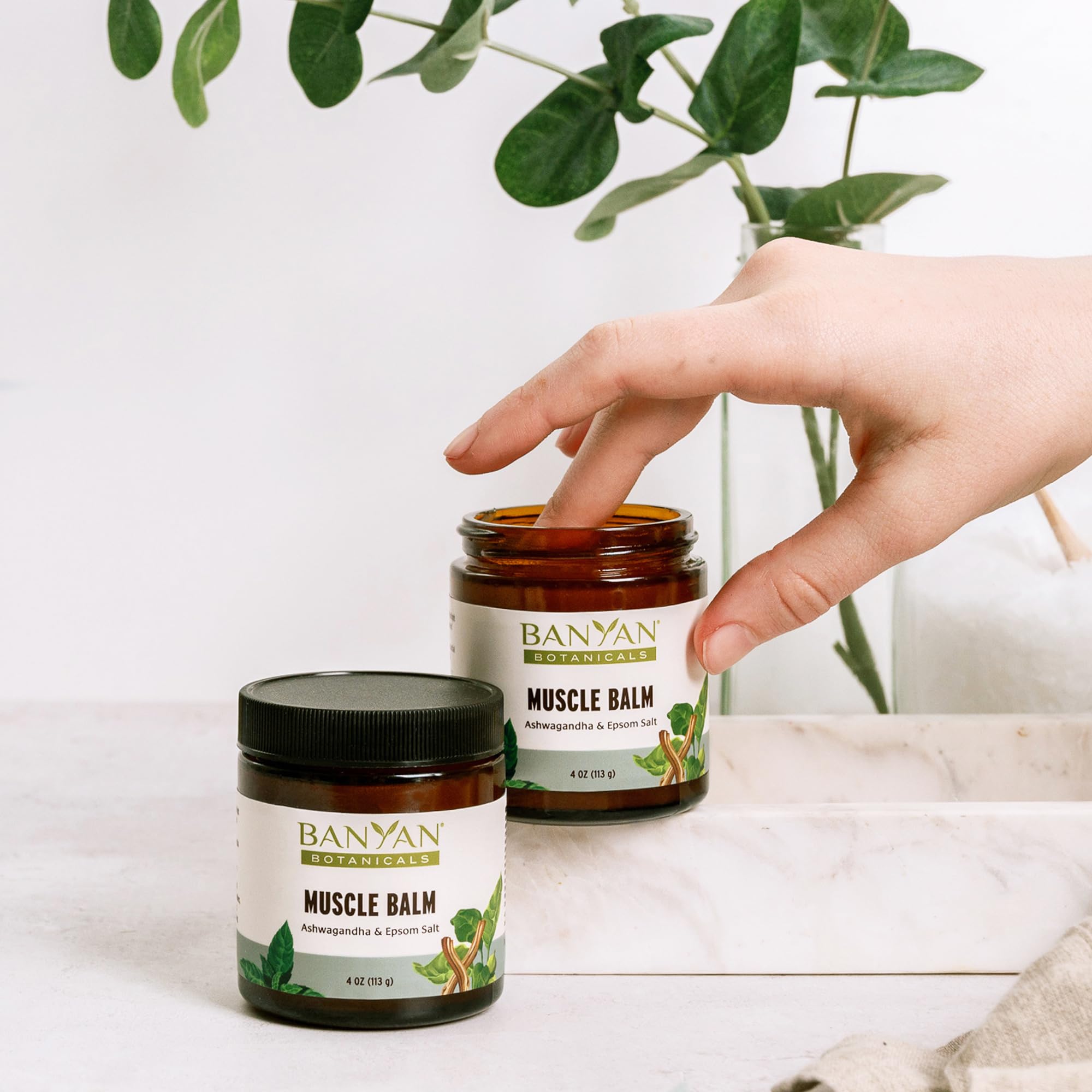 Banyan Botanicals 4 oz jar ready for post-workout massage and recovery