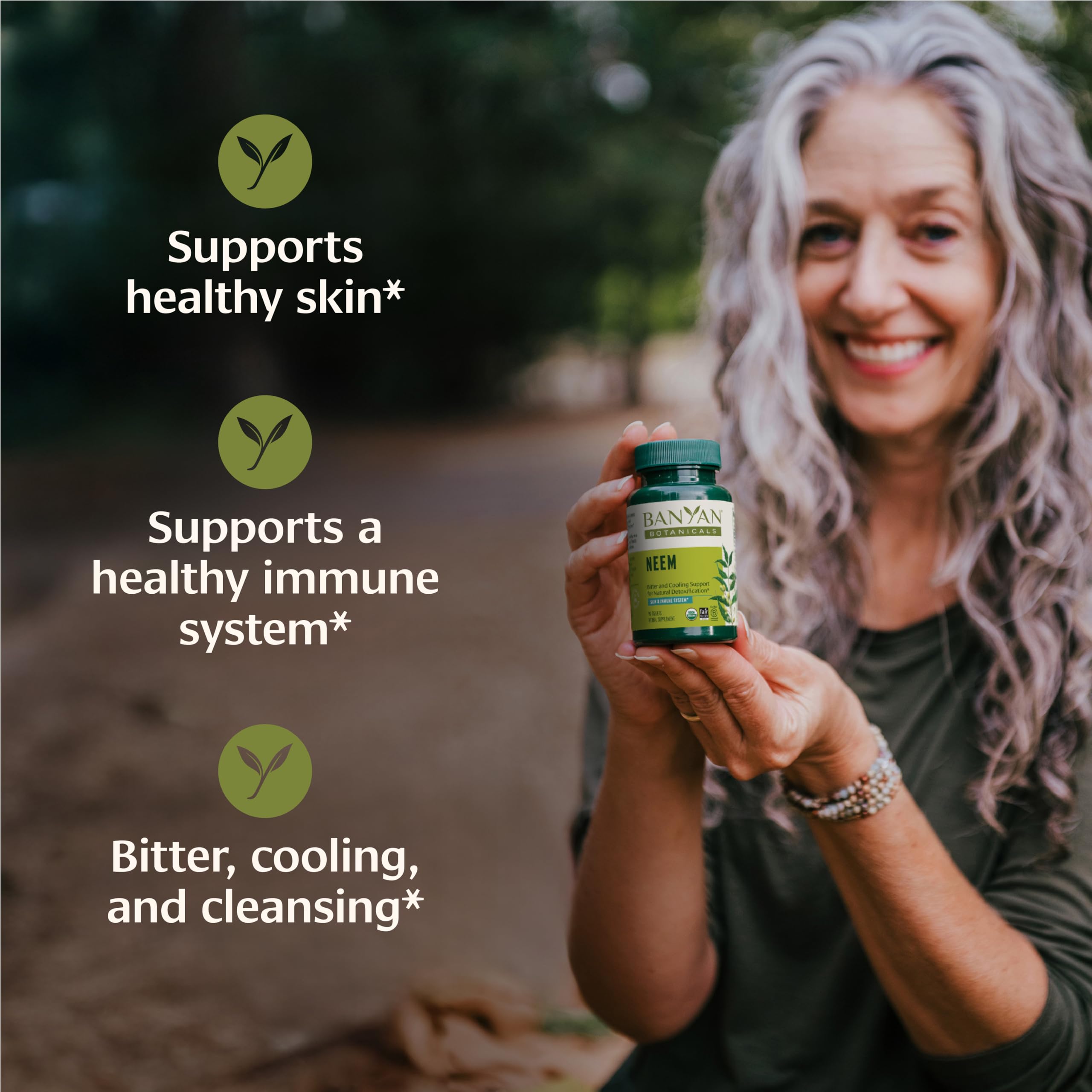 Banyan Botanicals Neem Tablets bottle pour demonstrates convenient daily dosing.