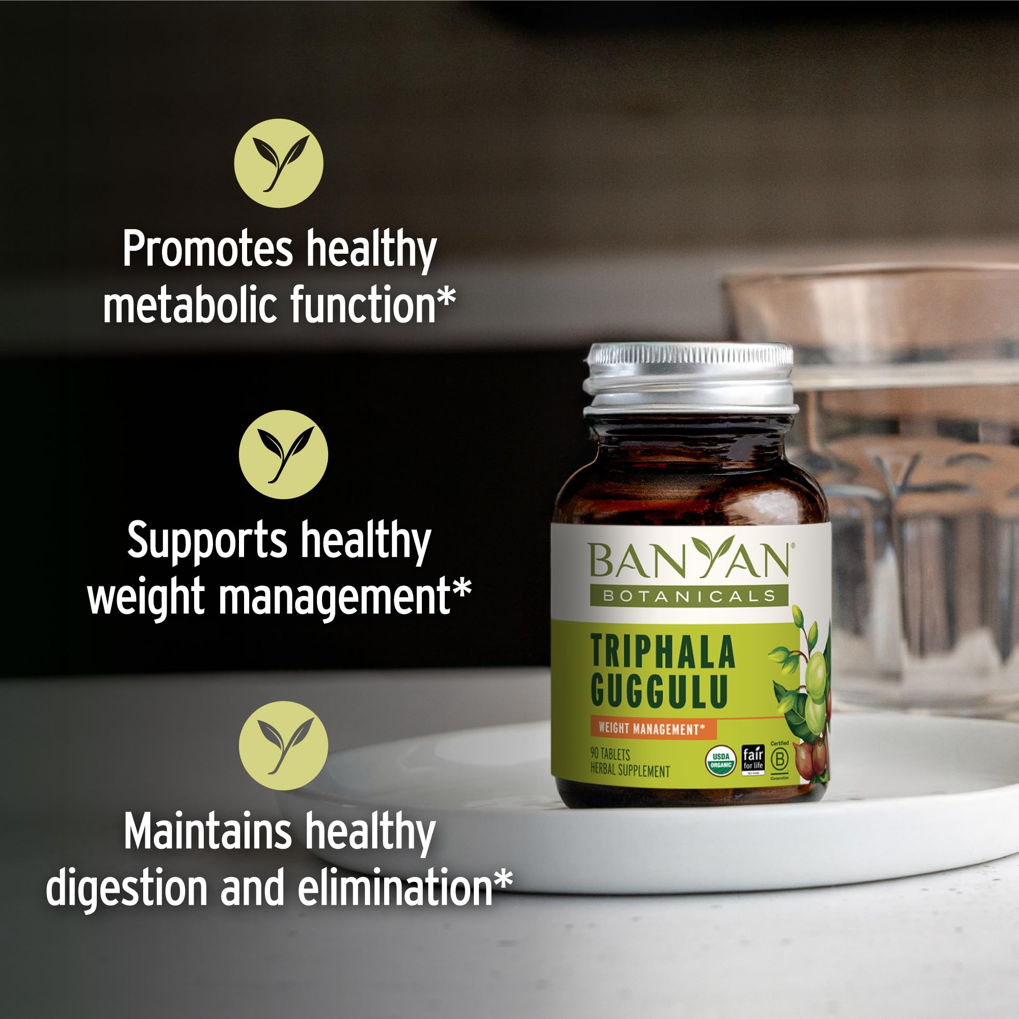 Triphala Guggulu tablets close-up showing compact herbal tablets