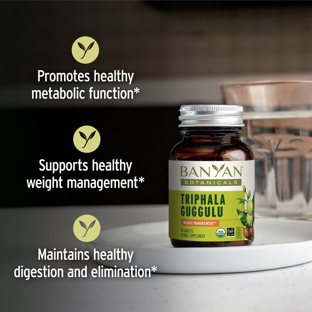 Triphala Guggulu tablets close-up showing compact herbal tablets