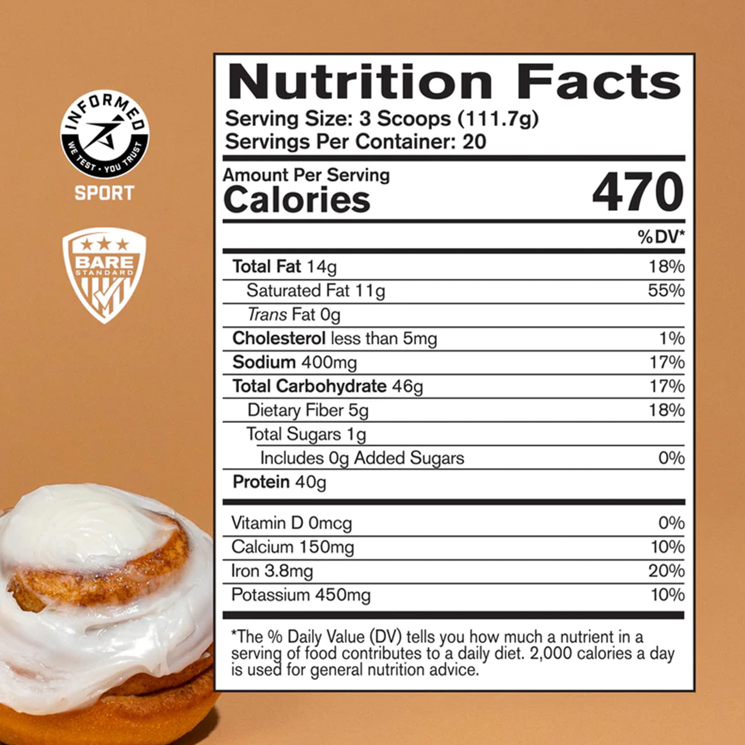 Pouring Bare Performance Nutrition Strong Food Cinnamon Roll into a glass for a protein-rich drink.
