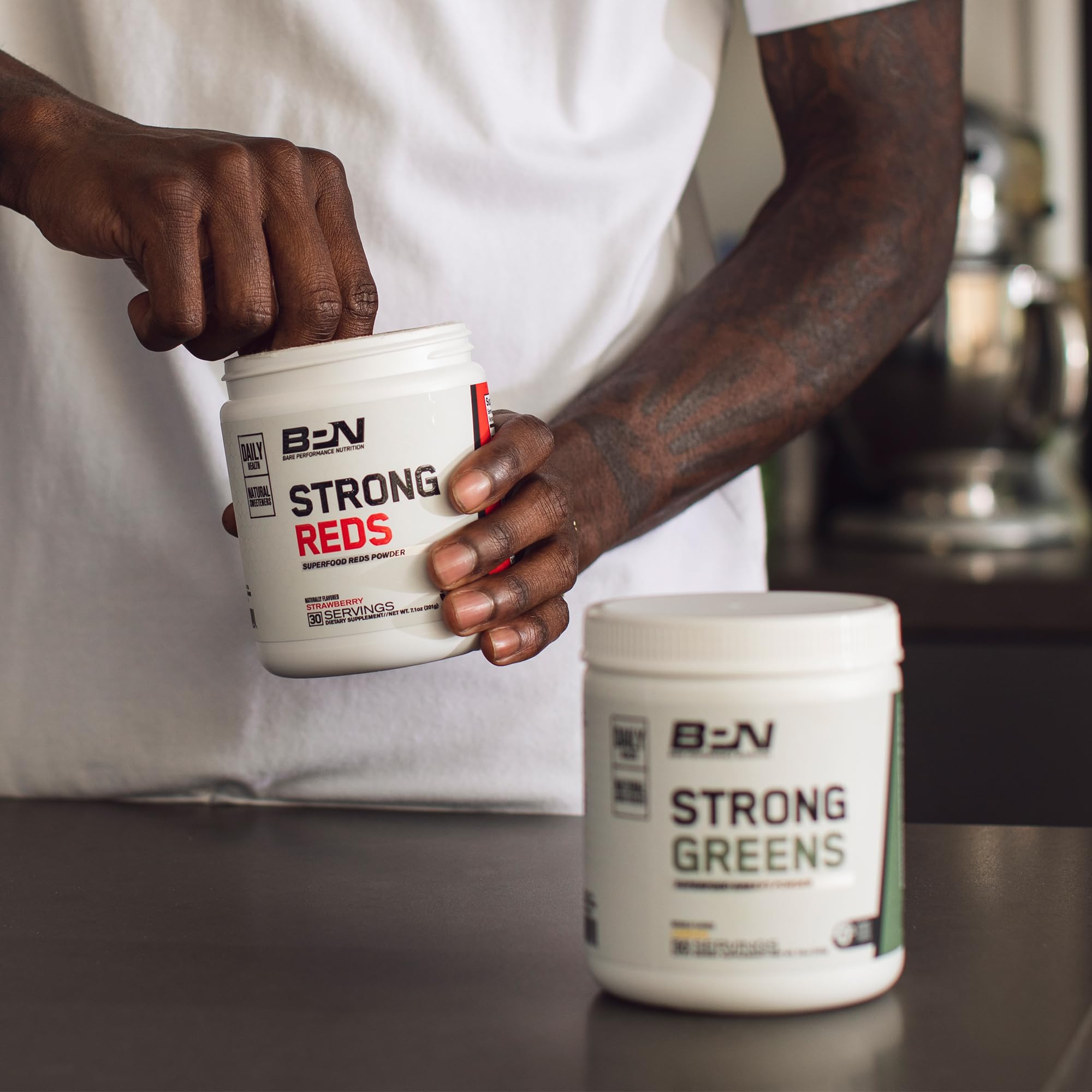 BARE PERFORMANCE NUTRITION Strong Greens serving with pineapple coconut flavor boosts daily vitality.