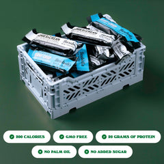 Cross-section of Barebells Creamy Crisp bar showing fudgy center and creamy texture.
