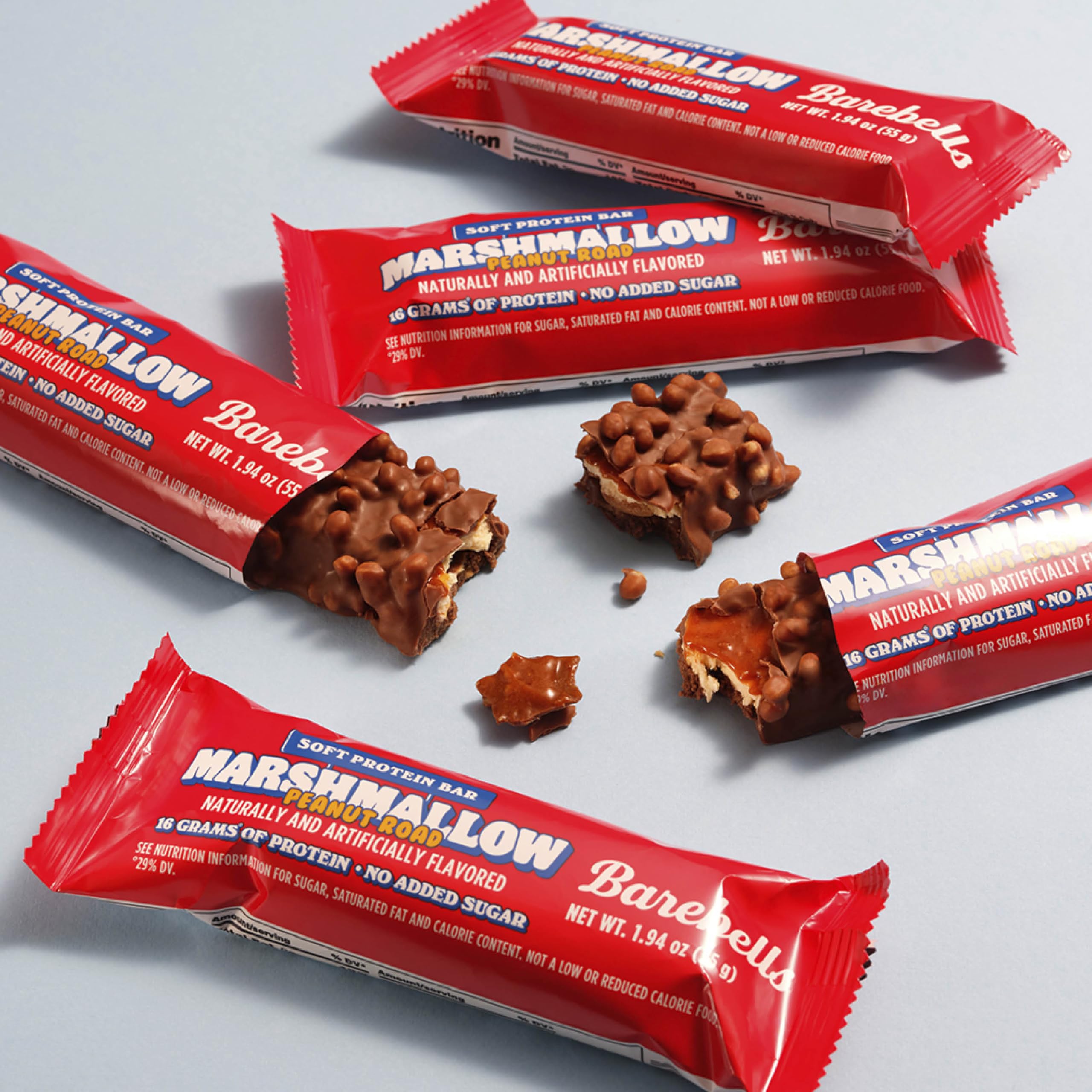 Barebells Marshmallow Peanut Road bar on desk; convenient on the go.