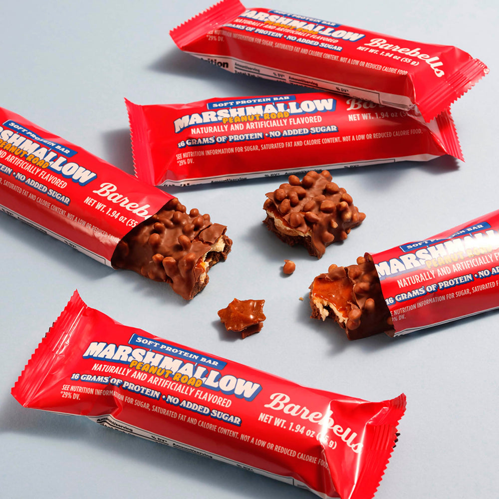 Barebells Marshmallow Peanut Road bar on desk; convenient on the go.
