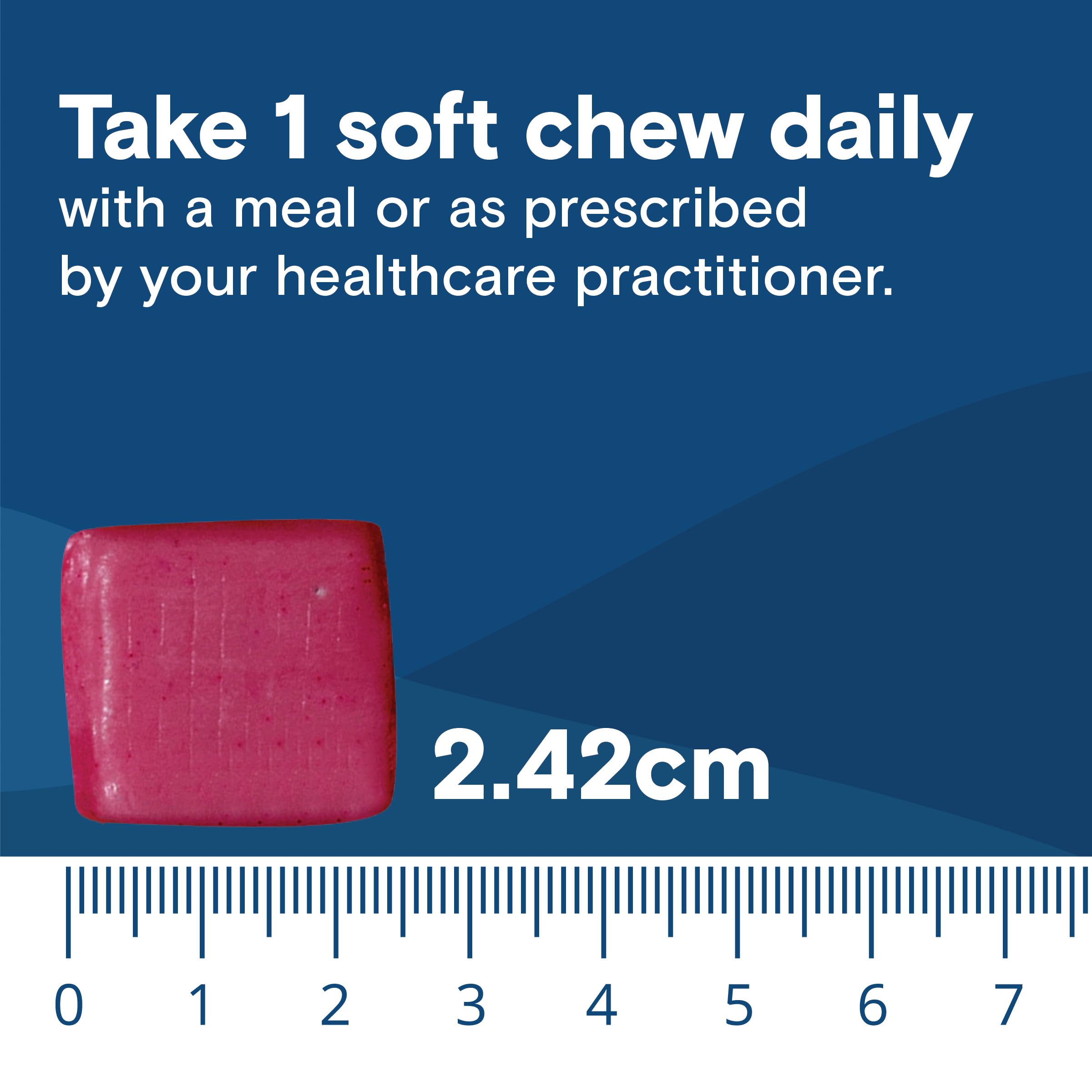 Bariatric Fusion cherry chew texture beside glass of water implies easy consumption.