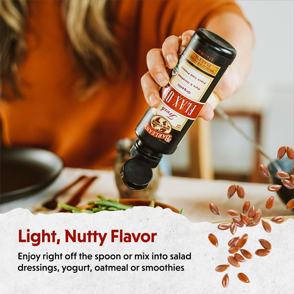 Barlean's flaxseed oil glass with oil ready for a serving.