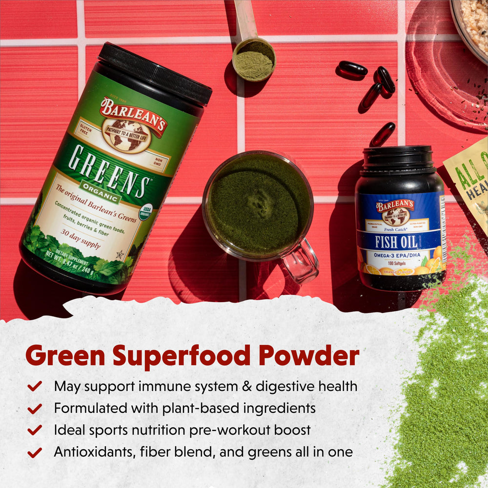 Barlean's Wheatgrass, Spirulina, and Chlorella green powder poured for smoothies.