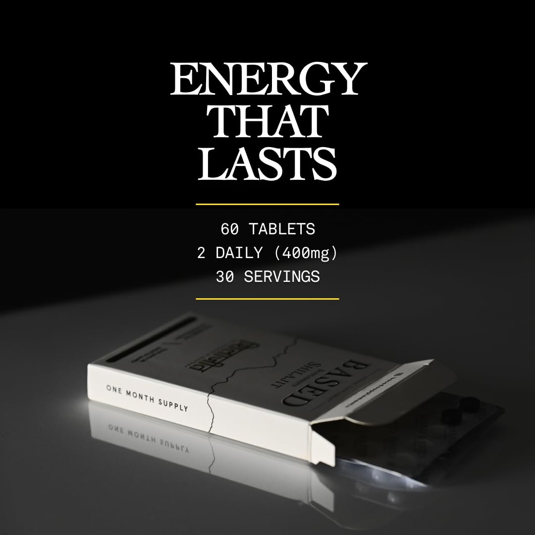 Based Shilajit tablets poured into glass with water for easy ingestion