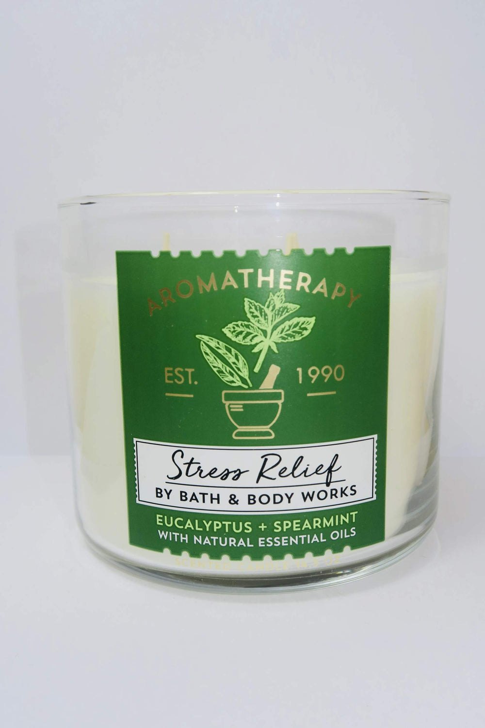 Bath & Body Works Aromatherapy Stress Relief candle artwork showing seasonal color variation for a cozy mood.
