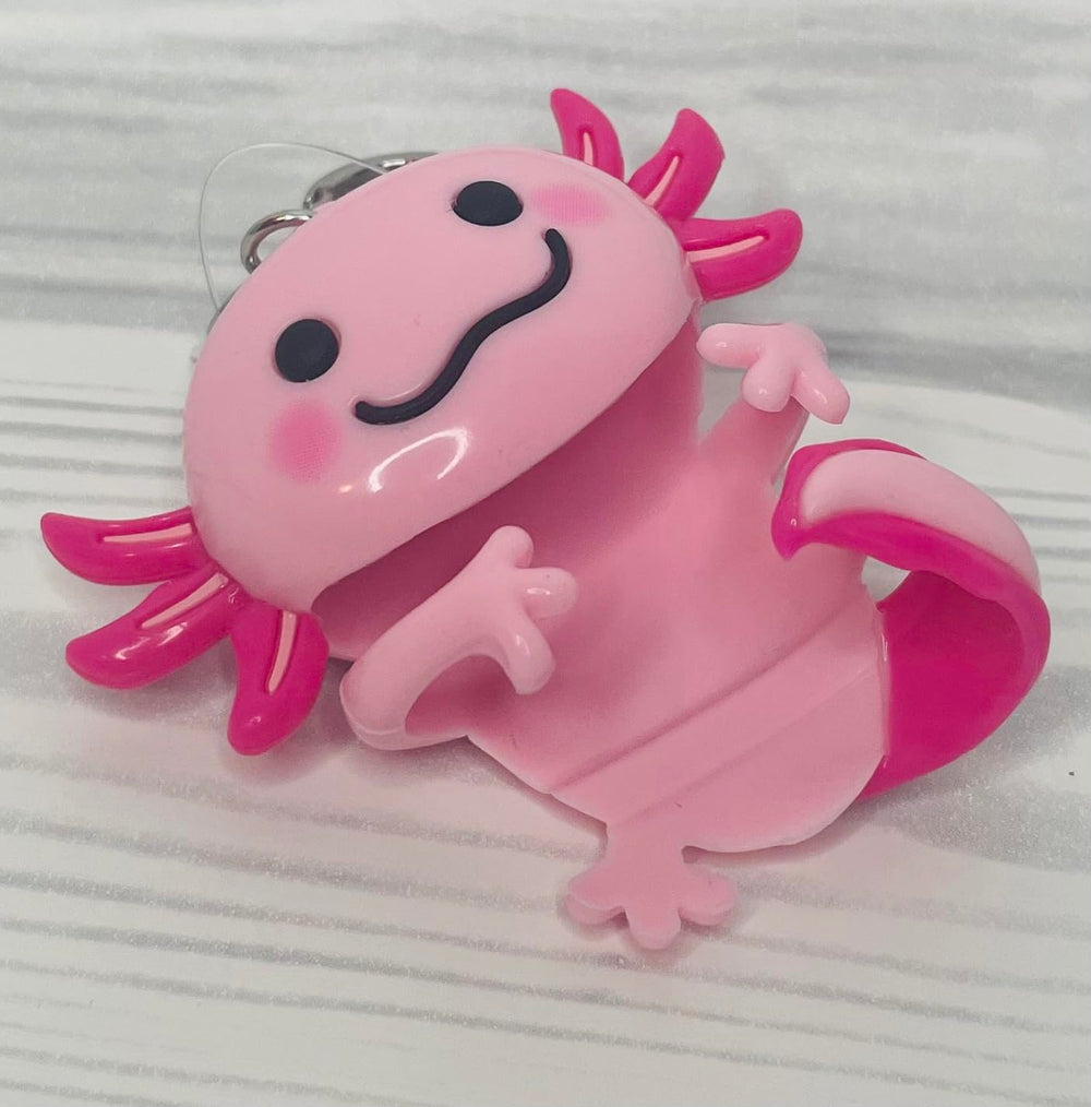 Bath & Body Works Pink Axolotl PocketBac Holder attached to backpack for on-the-go access