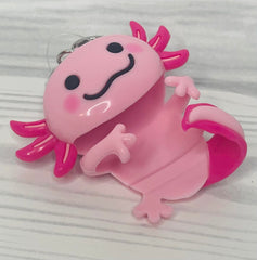Bath & Body Works Pink Axolotl PocketBac Holder attached to backpack for on-the-go access