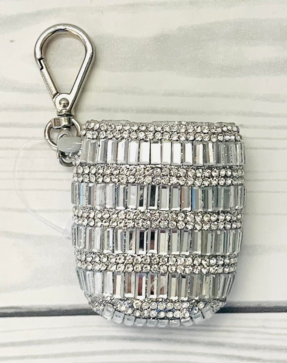 Silver-tone clip on the baguette gemstones PocketBac holder ready for travel.