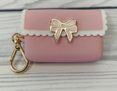 Bath and Body Works Sweetheart Song display image showing compact sanitizer holder for purses.