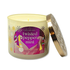Bath & Body Works Twisted Peppermint candle creates cozy winter ambiance in a room