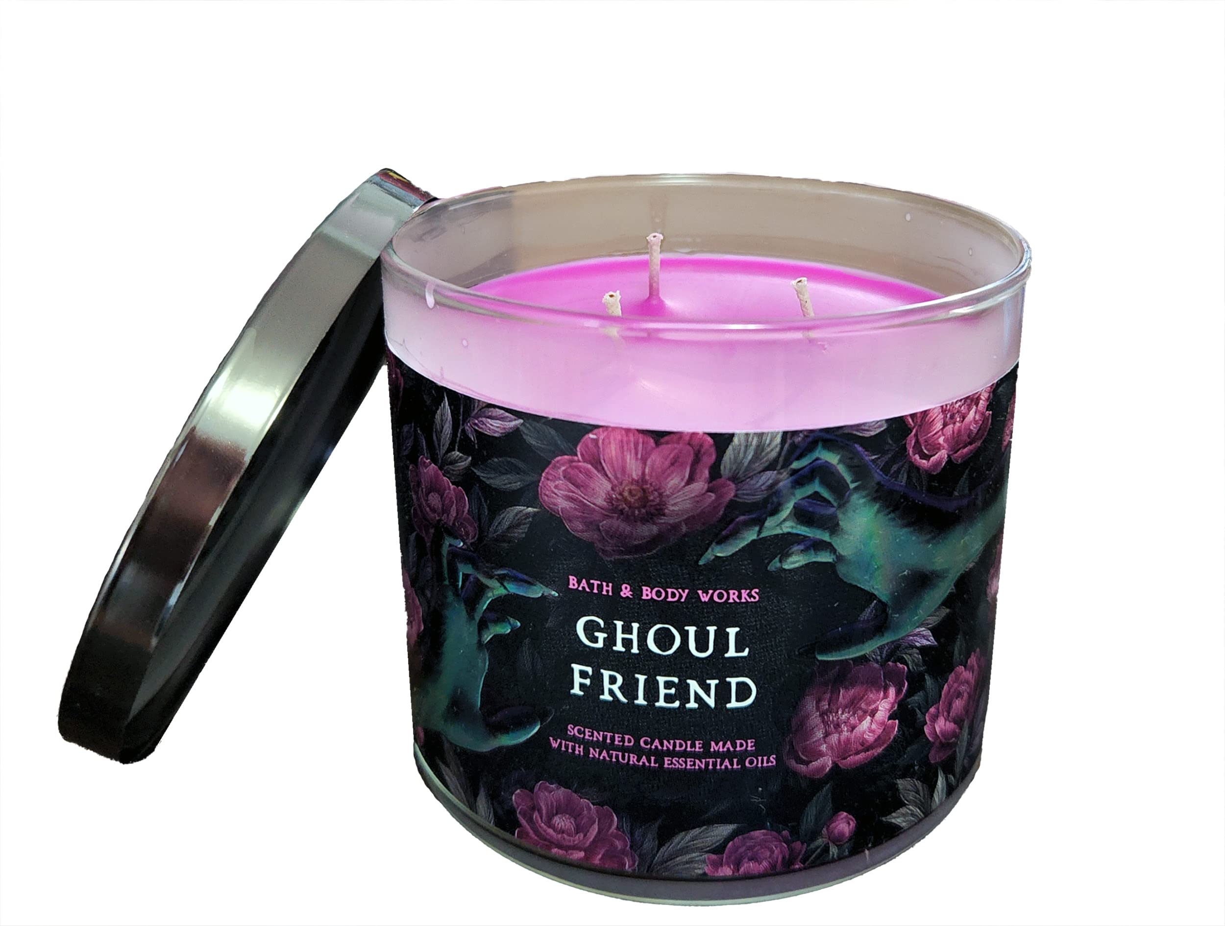 Bath & Body Works White Barn candle close-up highlights essential oils aroma.