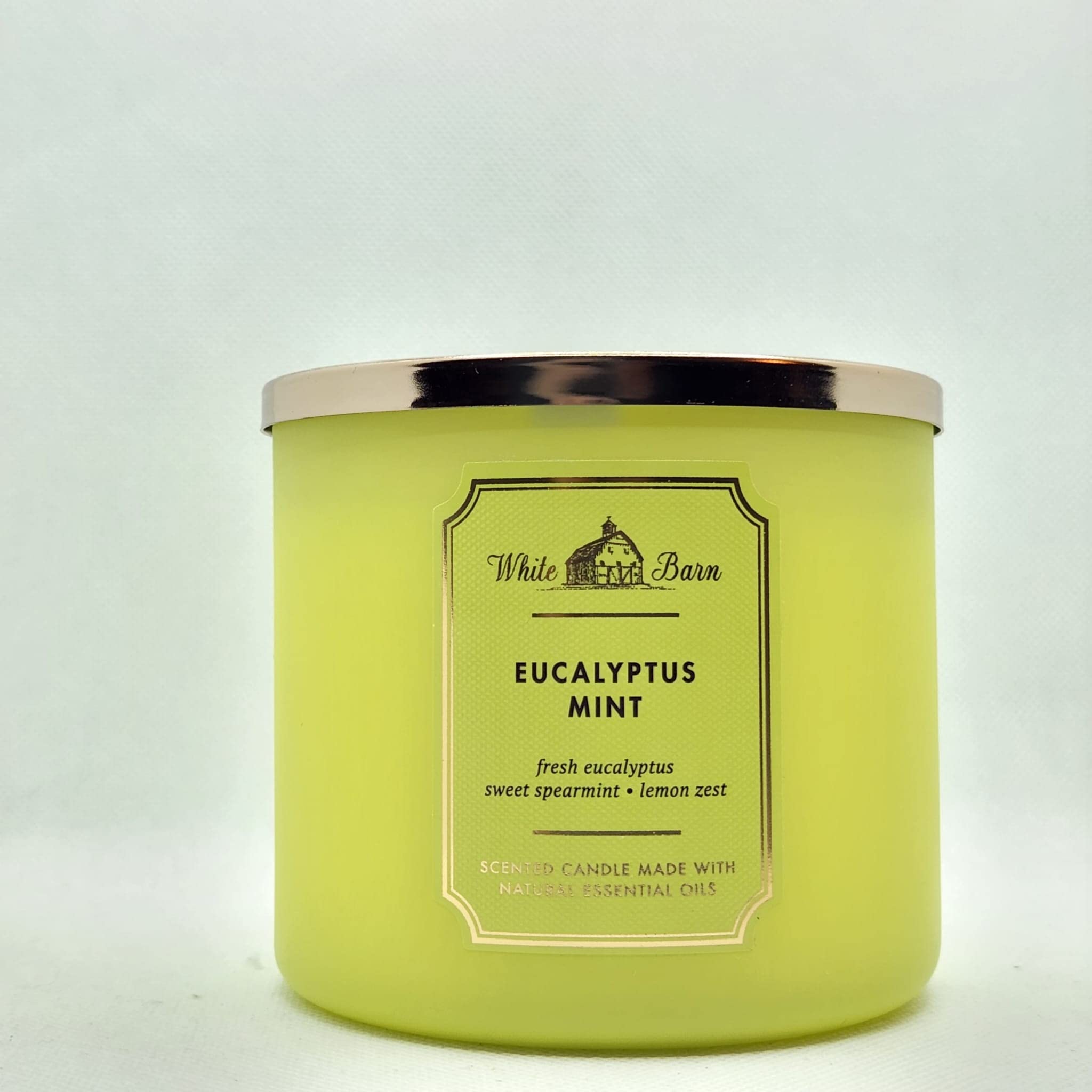 Bath & Body Works White Barn 3-Wick Candle Eucalyptus Mint, jar close-up for a fresh ambiance.