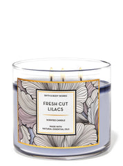 Bath & Body Works White Barn 3-Wick Candle lilacs emitting a cozy, inviting glow