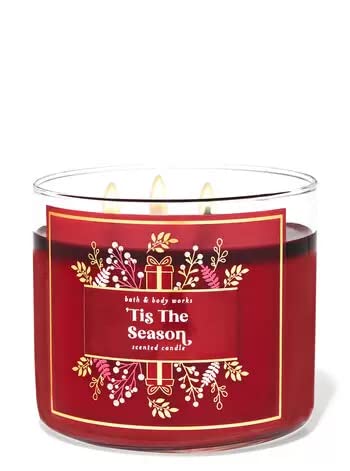 Bath and Body Works White Barn Tis the Season 3-wick candle glowing for cozy evenings.