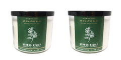 Bath & Body Works Aromatherapy candle jar with flame in eucalyptus spearmint for refreshing mood.