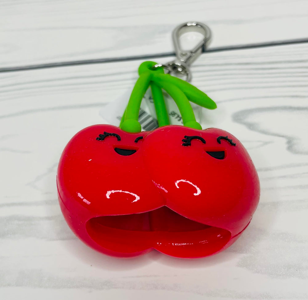 Bath & Body Works PocketBac holder close-up highlights festive cherries and versatile on-the-go usage