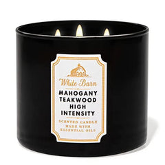 Bath & Body Works White Barn 3-Wick Candle Mahogany Teakwood creates a warm, inviting ambiance.