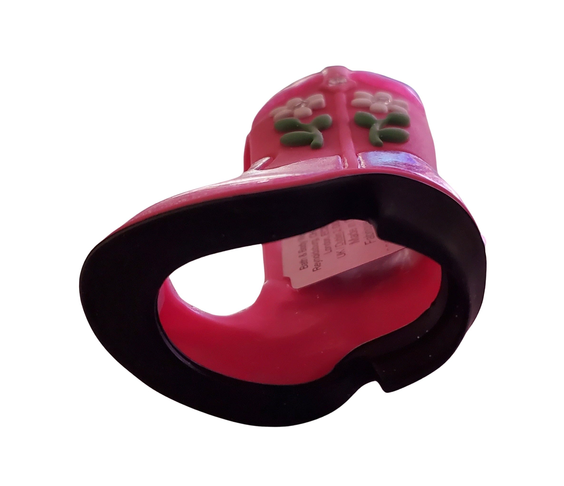 Bath and Body Works pink boot ornaments closeup emphasizes decorative flair and charm.