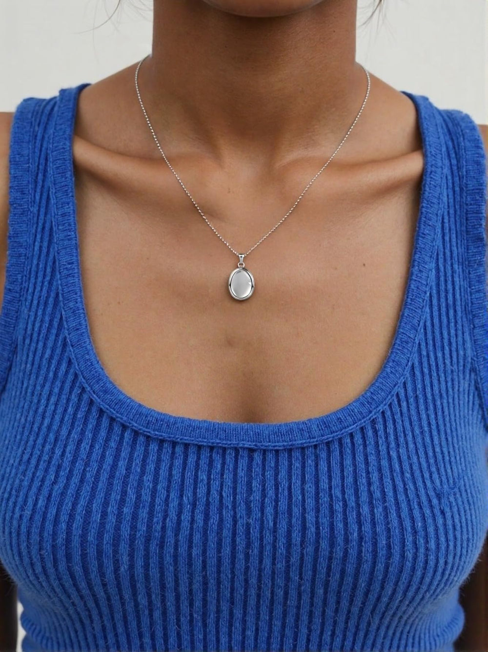 BBPM Worry Stone Necklace close-up rubbing surface promotes breathing.