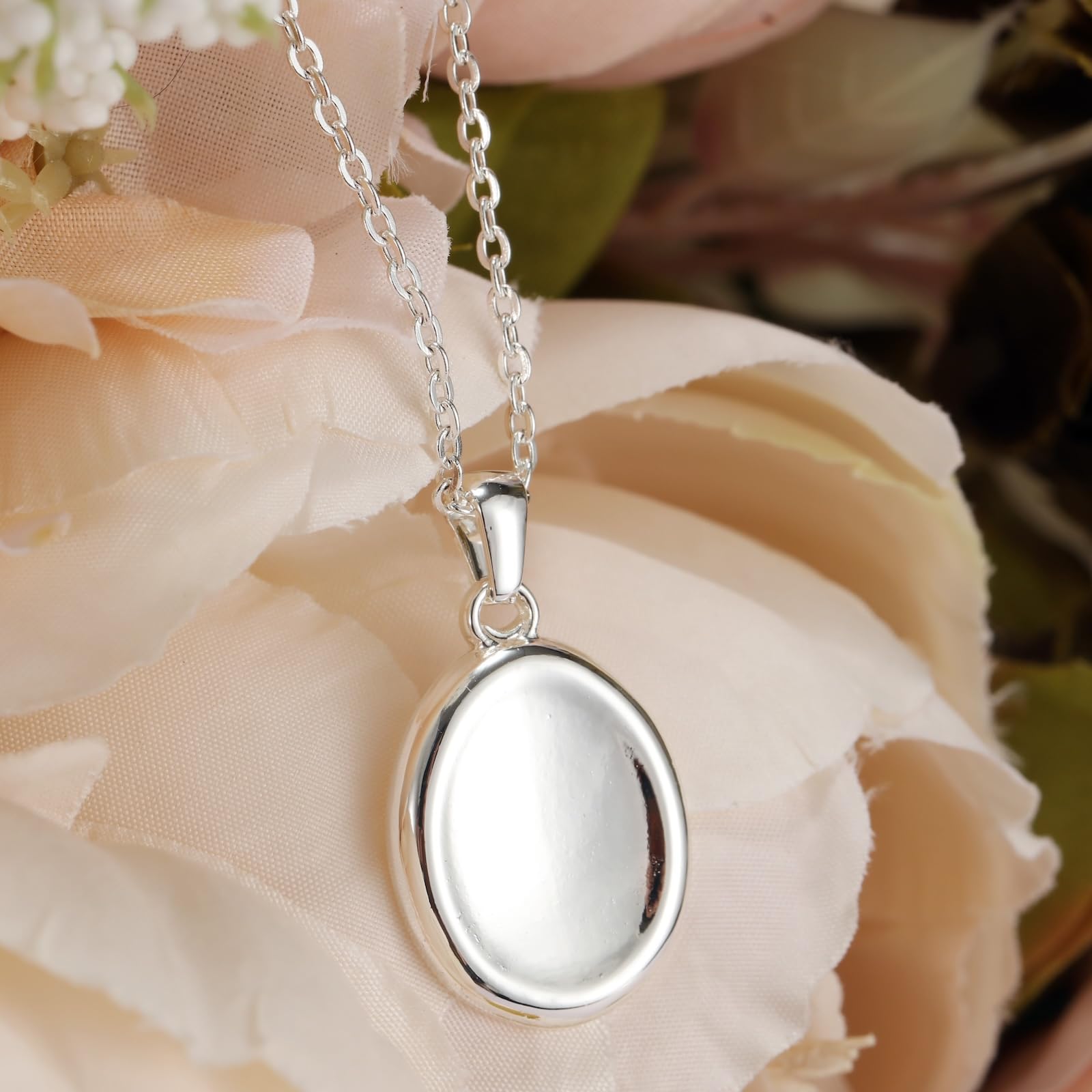 BBPM Worry Stone Necklace on neck with soft lighting adding versatile style day or night.