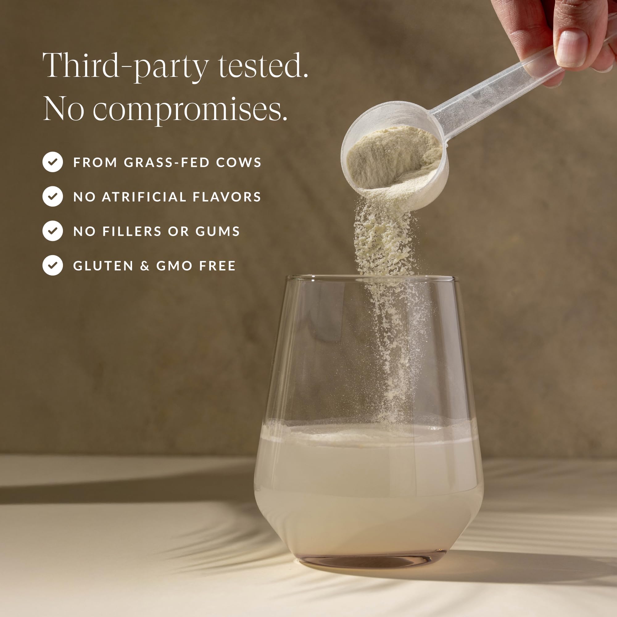 Beam Colostrum Powder sits beside fruits, suggesting easy daily use.