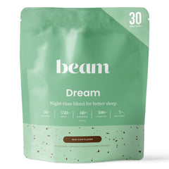 Beam Dream Sleep Powder tub showing a vegan, non-GMO formula for a calming evening