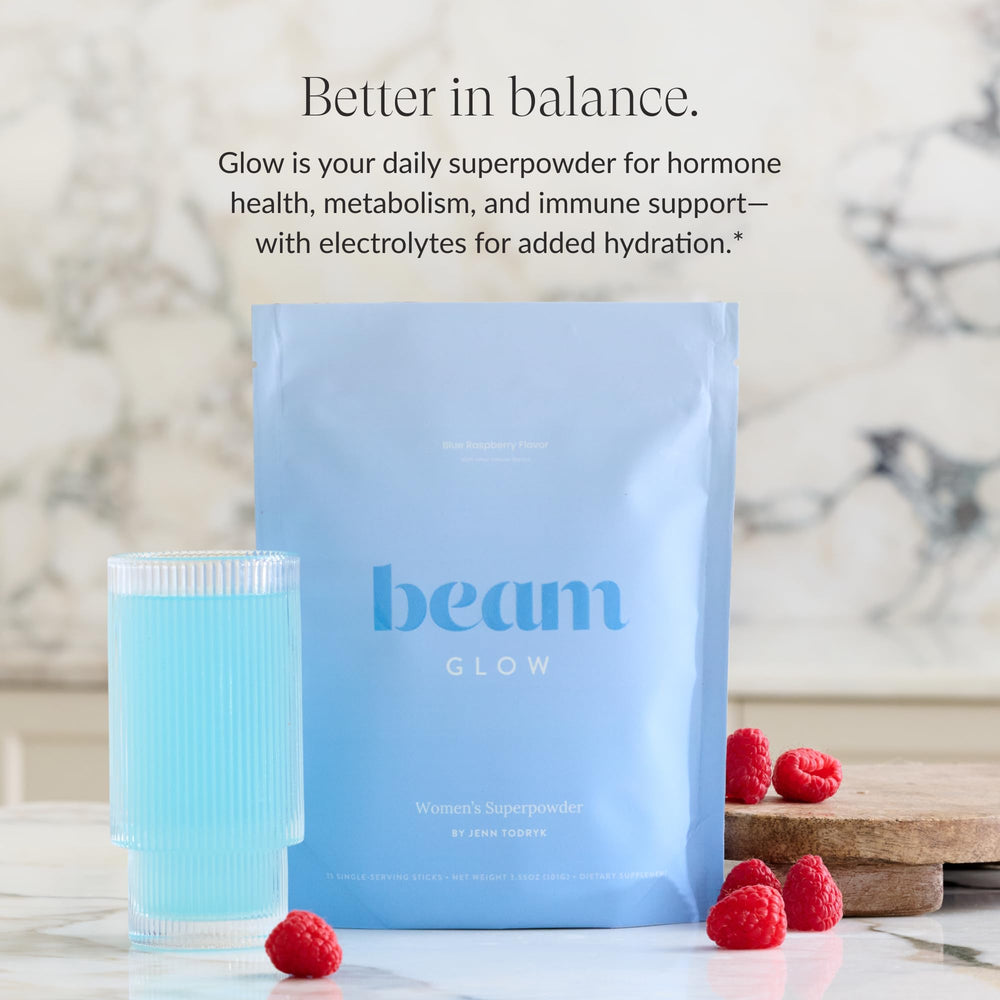 Beam Glow powder being poured for simple daily balance support.
