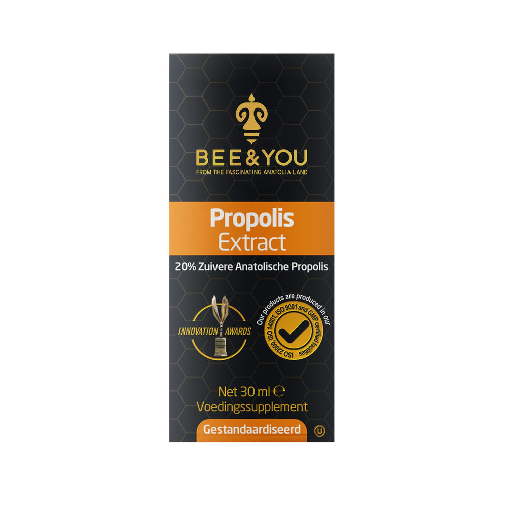 Bee & You drops beside a cup of tea for soothing daily routine.