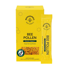 Beekeeper's Naturals bee pollen stick pack on kitchen counter showing compact on-the-go format