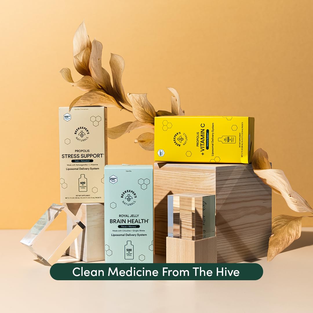 Beekeeper's Naturals Brain Health bottle beside water for easy daily use