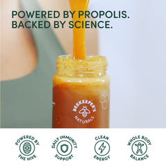 Beekeeper's Naturals Superfood Honey spoon dipping for quick energy before workouts.
