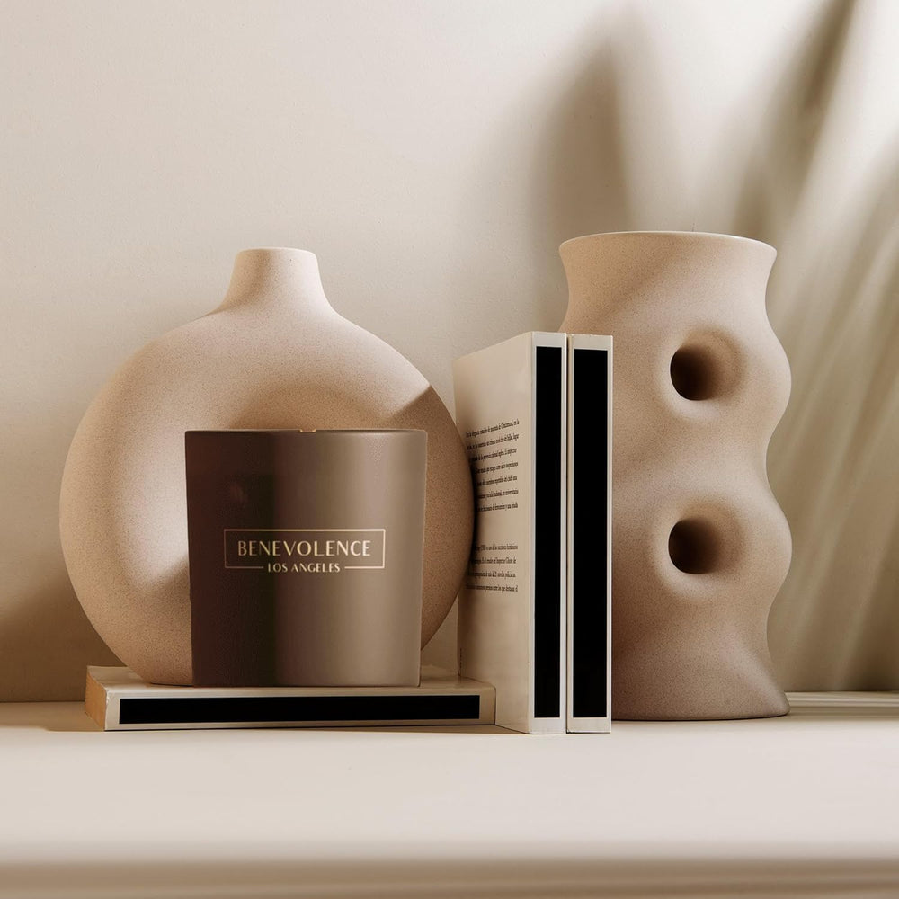 Benevolence LA Bergamot Jasmine candle being unwrapped for a thoughtful gift
