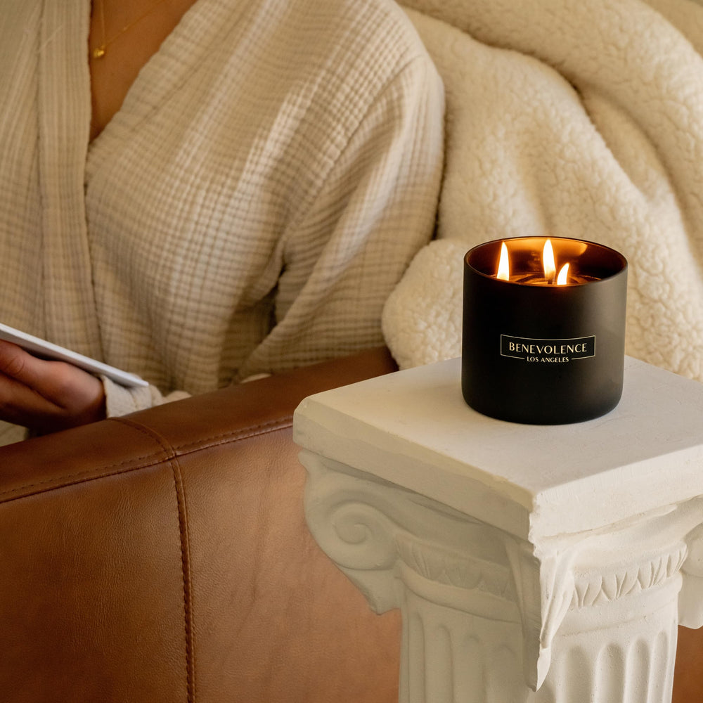 Benevolence LA closeup of black wax candle jar showing premium craftsmanship.