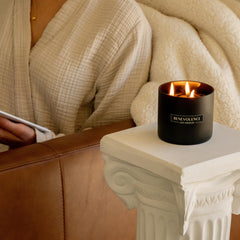 Benevolence LA closeup of black wax candle jar showing premium craftsmanship.