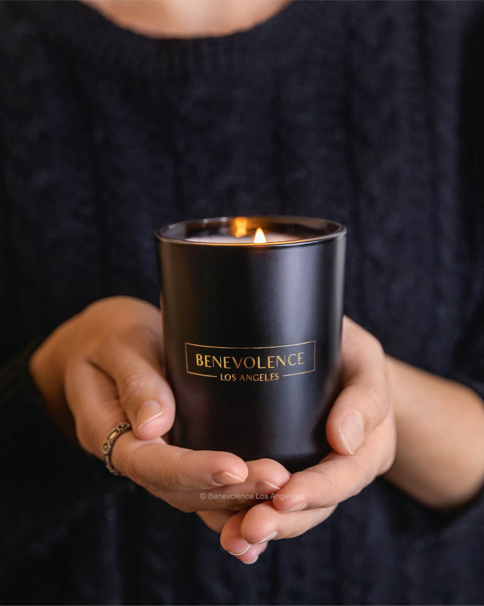 Benevolence LA holiday aroma candle releases festive bergamot and jasmine notes