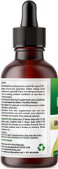 Close-up of glass bottle label highlighting purity and non-GMO.