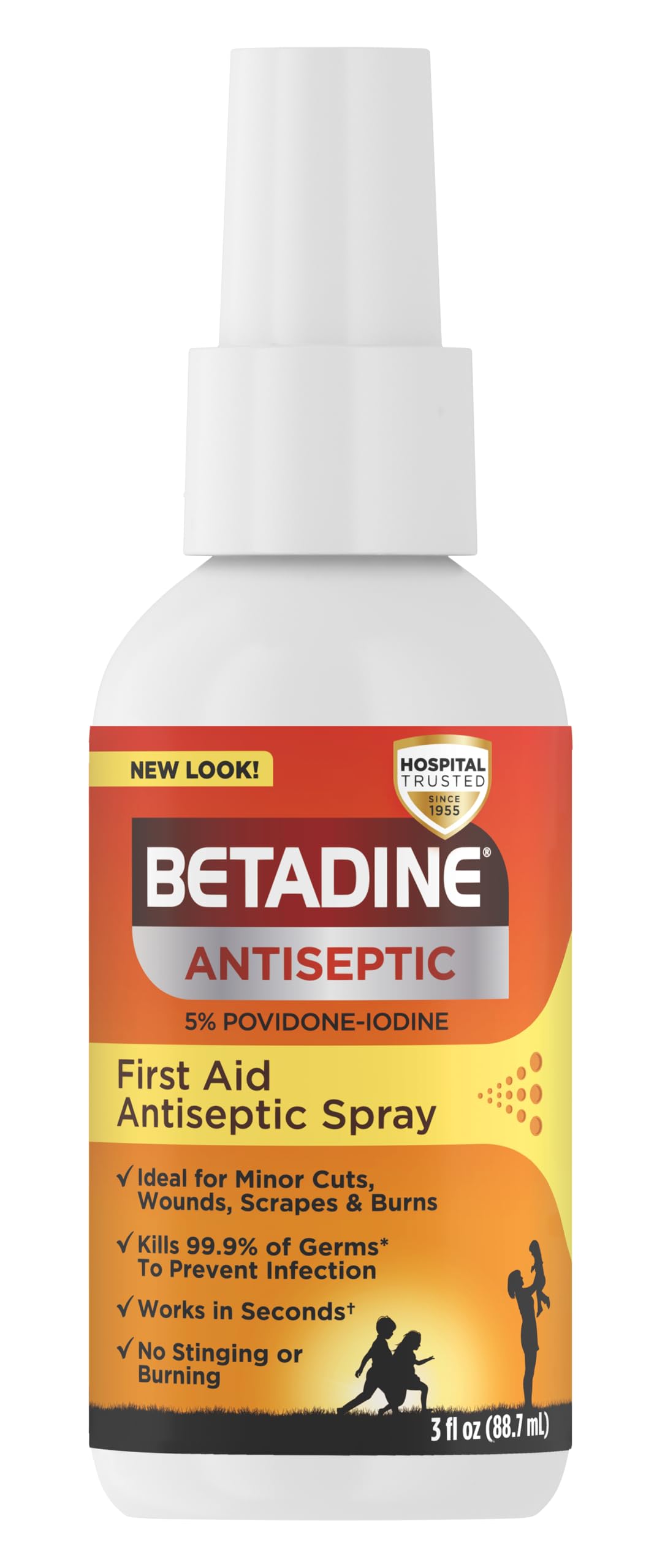Betadine antiseptic spray applied to a small wound on skin.