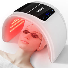 Beuwe red-light therapy mask on the face for at-home skin rejuvenation.